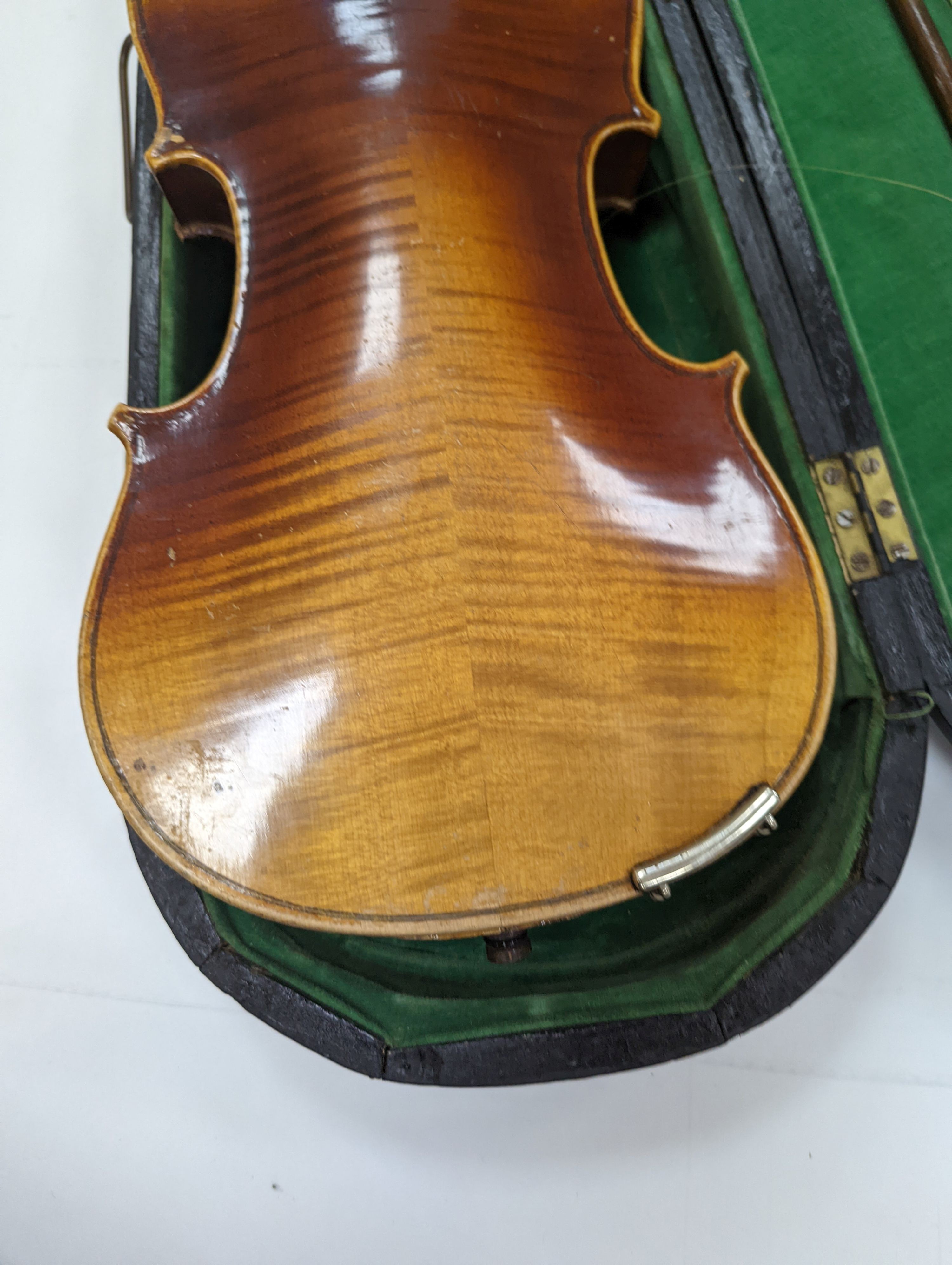 Two cased violins and bows, one with ‘Antonius Straduarius Cremonensis Faciebat Anno 17/13 Made In Czechoslovakia’ label to interior